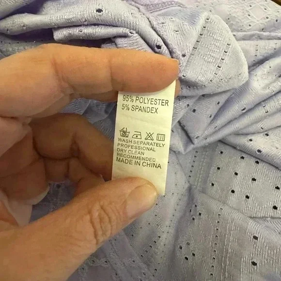 Lavendar eyelet top with buttons detailed on sleeve. Worn 2x.  Smoke free home. - Picture 5 of 5